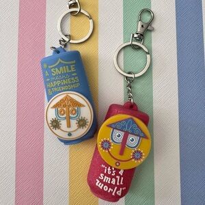 Disney “it’s a small world” sanitizer holder